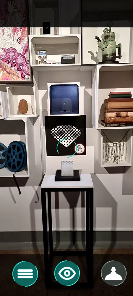 Artisan AR interface showing scan and content controls.